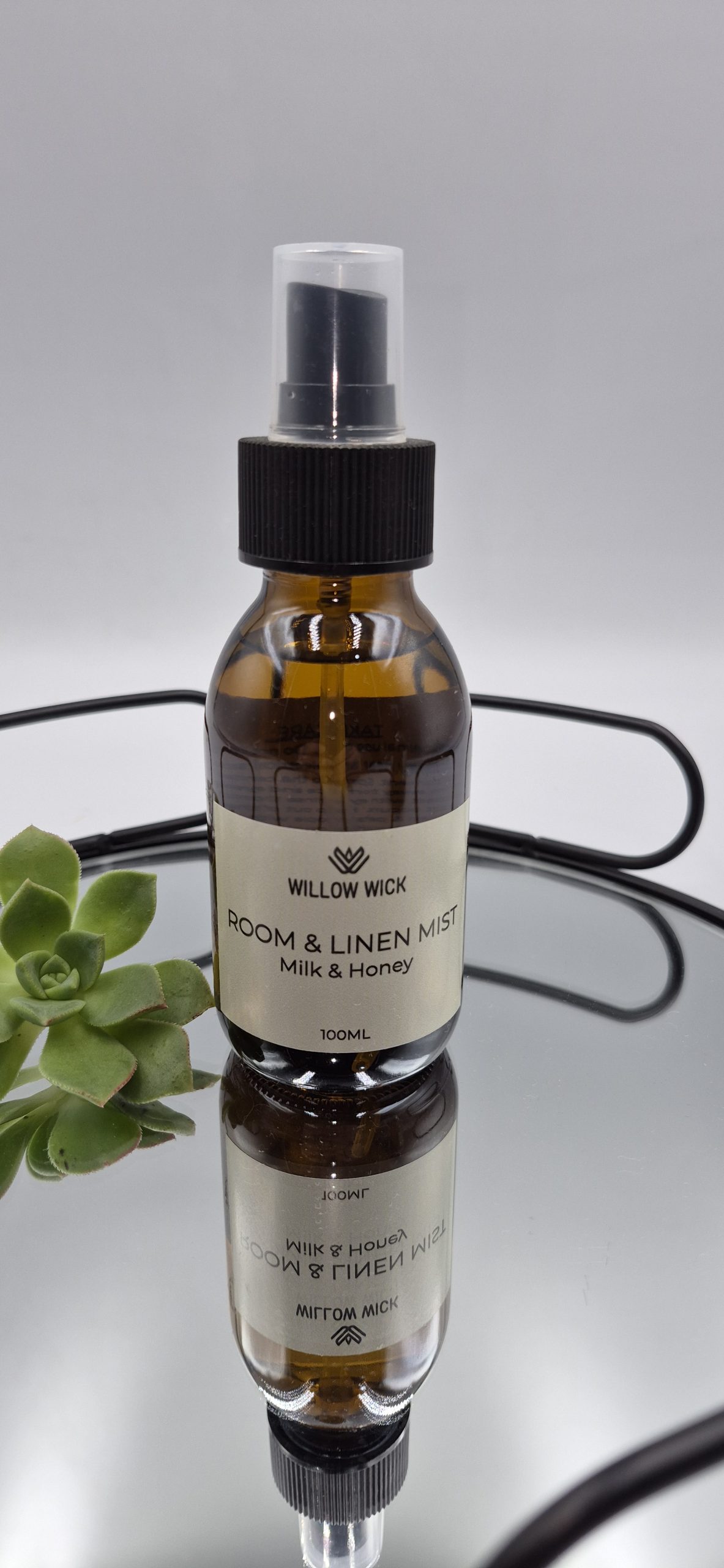 Willow Wick Milk and Honey Room and Linen Mist in a 100ml amber glass bottle for refreshing rooms, bedding and linen.